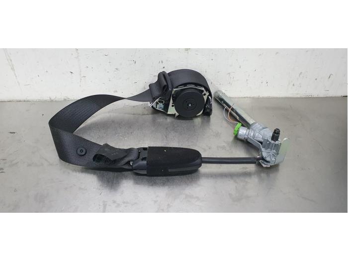 Seatbelt tensioner, right from a Opel Corsa D 1.3 CDTi 16V ecoFLEX 2012