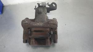 Used Rear brake calliper, left Renault Scénic II (JM) 1.6 16V Price € 25,00 Margin scheme offered by De Witte Boerderij B.V.