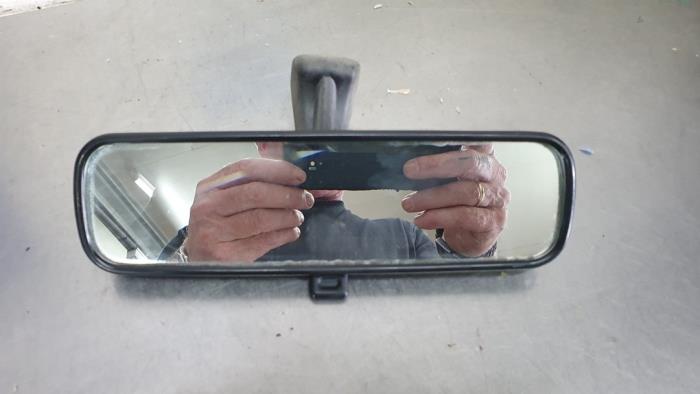 Rear view mirror from a Toyota Corolla (E12) 1.8 16V TS VVT-i 2003