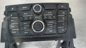 Used Radio control panel Opel Astra J Sports Tourer (PD8/PE8/PF8) 1.6 CDTI 16V Price € 65,00 Margin scheme offered by De Witte Boerderij B.V.