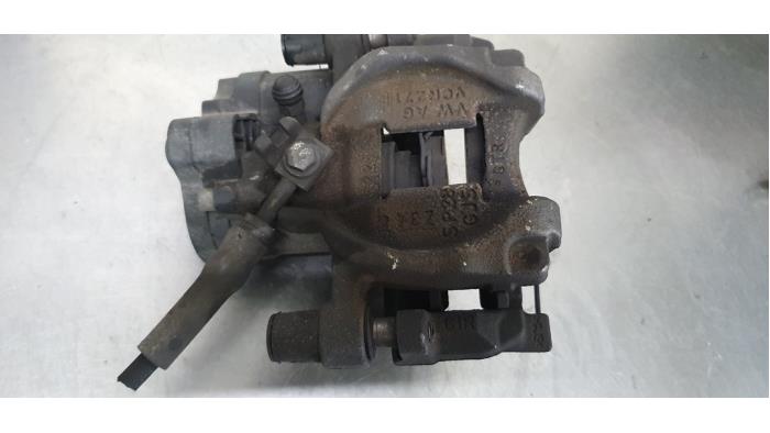 Rear brake calliper, left from a Volkswagen T-Roc 1.5 TSI Evo BMT 16V 2019