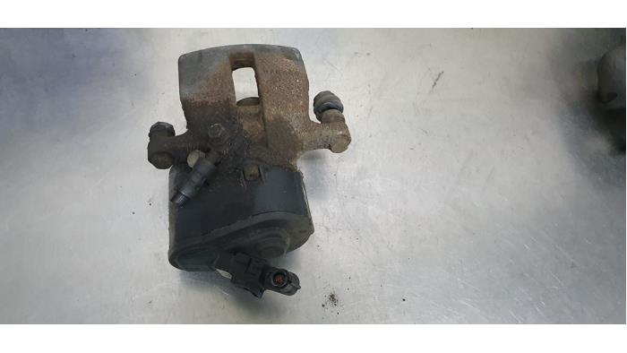 Rear brake calliper, left from a Volkswagen Passat Variant (365) 1.8 TSI 16V 2011