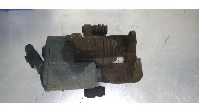Rear brake calliper, left from a Volkswagen Passat Variant (365) 1.8 TSI 16V 2011