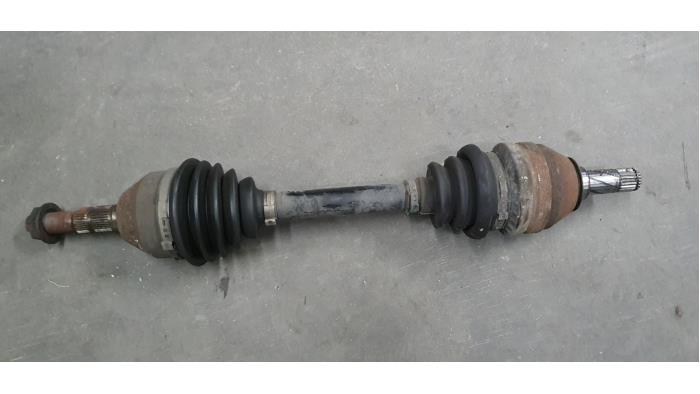 Front drive shaft, left from a Opel Zafira B 2010