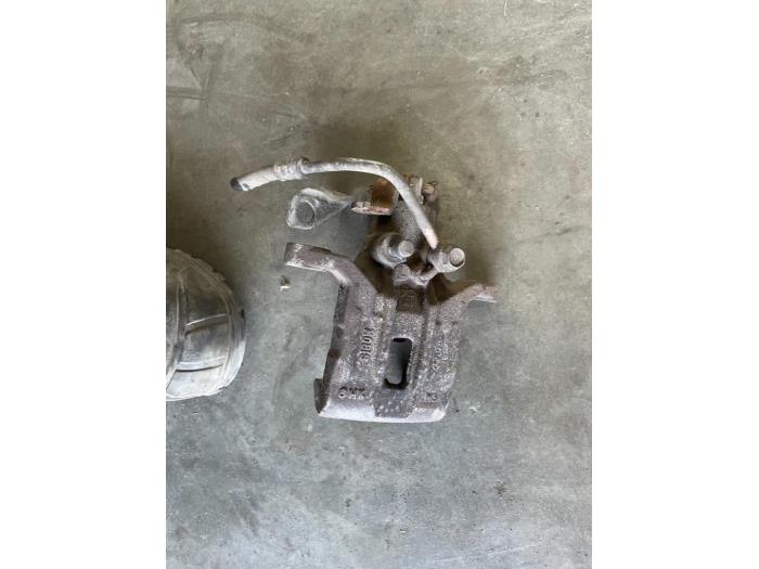 Rear brake calliper, left from a Kia Picanto (TA) 1.0 12V 2017