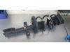 Front shock absorber rod, left from a Renault Clio IV (5R) 1.5 Energy dCi 90 FAP 2014