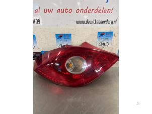 Used Taillight, left Opel Corsa D 1.2 16V Price € 20,00 Margin scheme offered by De Witte Boerderij B.V.