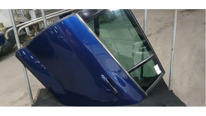 Rear door 4-door, left from a Renault Megane IV Estate (RFBK) 1.5 Energy dCi 110 2018