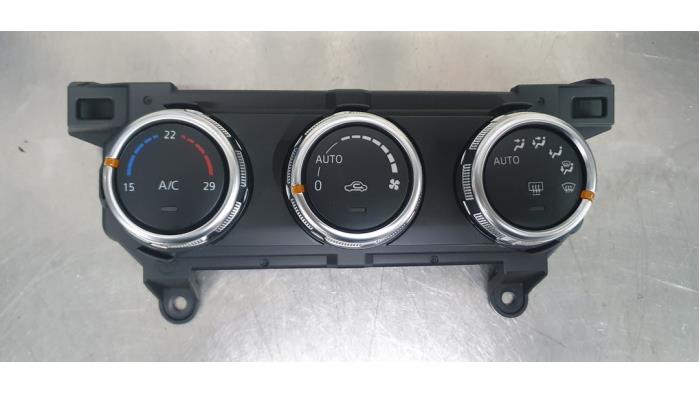 Heater control panel from a Mazda 2 (DJ/DL) 1.5 e-SkyActiv G 90 2023