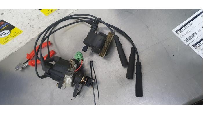Used Ignition system (complete) Daihatsu Cuore (L501) 850 Price € 35,00 Margin scheme offered by De Witte Boerderij AutoMotive