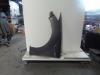 Front wing, left from a Ford Mondeo IV Wagon 1.6 TDCi 16V 2011