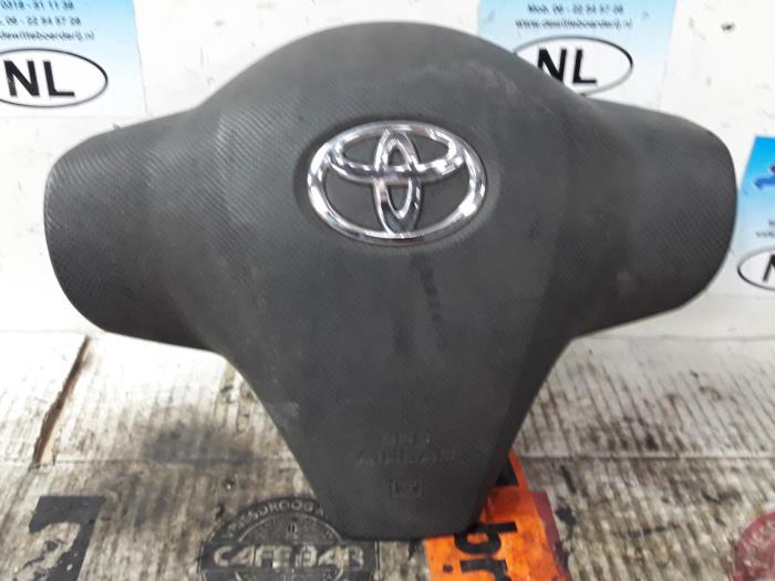 Left airbag (steering wheel) from a Toyota Yaris II (P9) 1.0 12V VVT-i 2008
