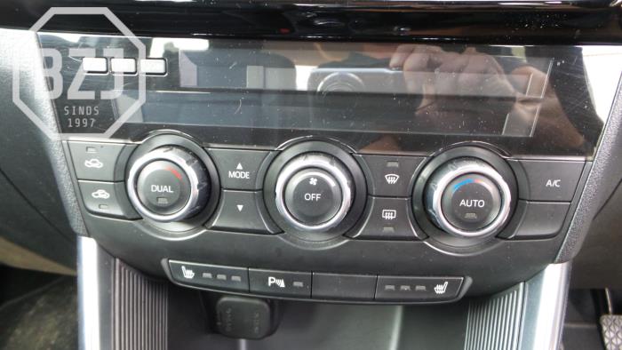 Używane Panel climatronic Mazda CX-5 I (KE,GH) 2.0 SkyActiv-G 165 16V 2WD Cena € 150,00 Procedura marży oferowane przez BZJ b.v.