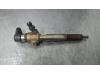 Injector (diesel) from a Renault Scenic 2011