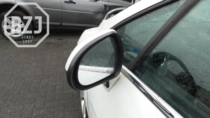 Außenspiegel links van een Peugeot 308 CC (4B) 2.0 HDi 16V Euro 5 FAP 2009