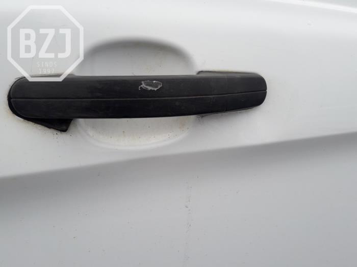 Porte latérale gauche d'un Ford Transit Custom 2.2 TDCi 16V 2014