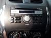 Reproductor de CD y radio de un Suzuki SX4 (EY/GY), 2006 1.6 16V 4x2, SUV, Gasolina, 1.590cc, 88kW (120pk), FWD, M16AVVT, 2009-07, EYA21; GYA21 2013
