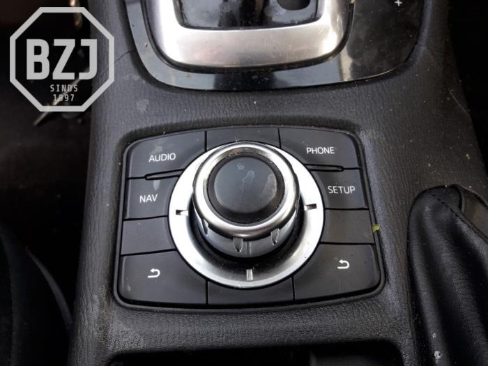 Navigation control panel from a Mazda 6 (GJ/GH/GL) 2.2 SkyActiv-D 150 16V 2015