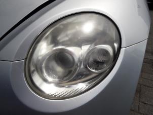Używane Reflektor lewy Daihatsu Copen 0.7 Turbo 16V Cena na żądanie oferowane przez BZJ b.v.