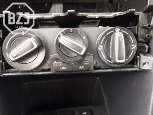 Usados Panel de control de calefacción Volkswagen Polo V (6R) 1.2 TSI 16V BlueMotion Technology Precio de solicitud ofrecido por BZJ b.v.