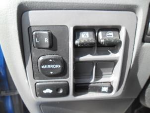 Used Electric window switch Daihatsu Cuore (L251/271/276) 1.0 12V DVVT Price on request offered by Boekholt autodemontage B.V