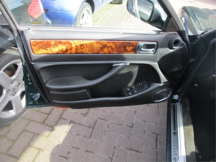 Door trim 4-door, front left from a Jaguar XJ6 (X300) 3.2 24V 1997