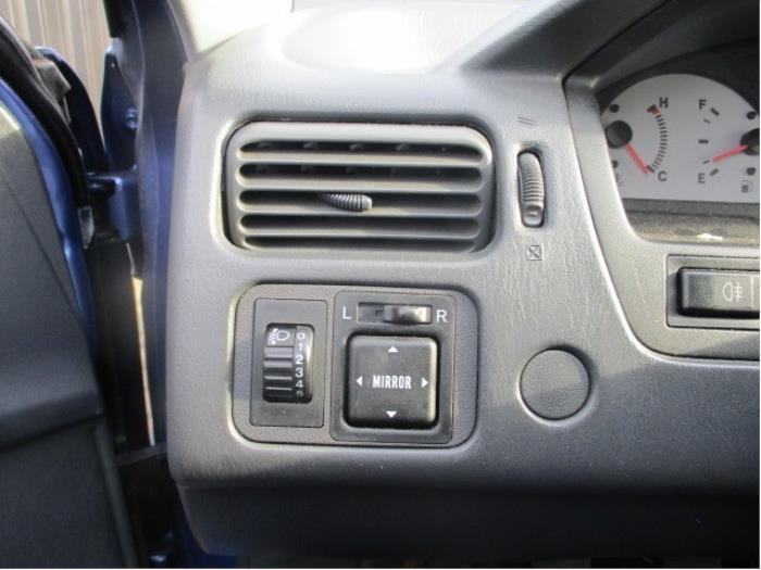 Fog light switch from a Toyota Paseo (EL54) 1.5i,GT MPi 16V 1997