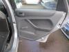 Rear door handle 4-door, right from a Ford Focus 2 Wagon, 2004 / 2012 1.6 TDCi 16V 90, Combi/o, Diesel, 1.560cc, 66kW (90pk), FWD, HHDA, 2004-11 / 2008-02 2006