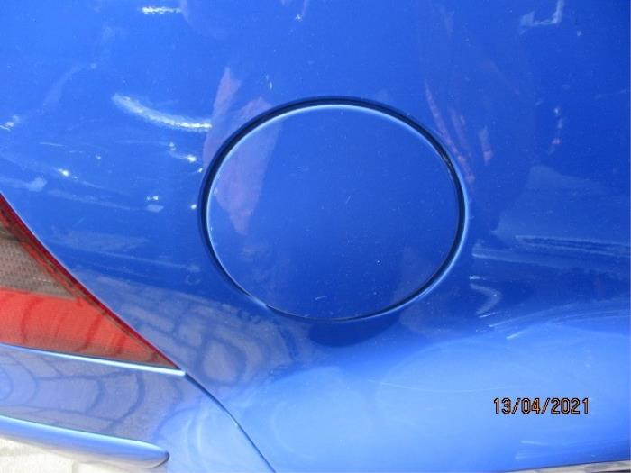 Tank cap cover from a Volkswagen Golf IV (1J1) 1.4 16V 1998