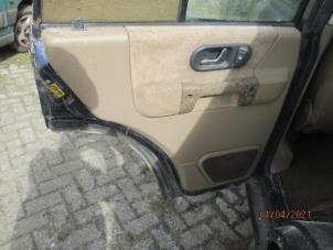 Used Rear door trim 4-door, left Landrover Discovery II 2.5 Td5 Price on request offered by Boekholt autodemontage B.V