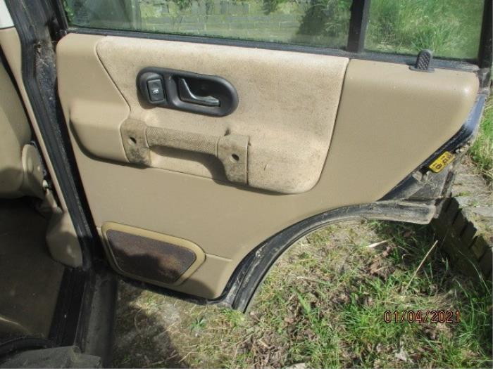 Revêtement portière 4portes arrière droite d'un Land Rover Discovery II 2.5 Td5 2002