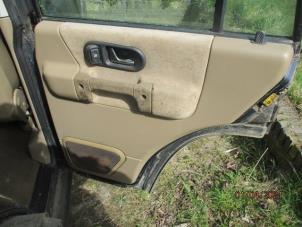 Used Rear door trim 4-door, right Landrover Discovery II 2.5 Td5 Price on request offered by Boekholt autodemontage B.V
