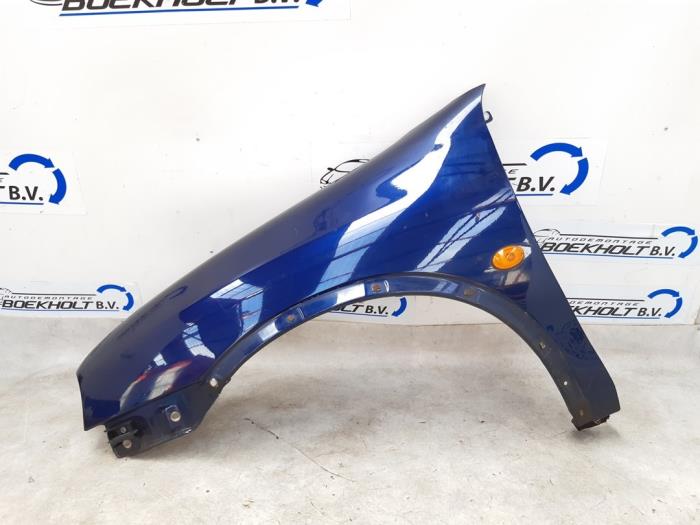 Front wing, left from a Opel Corsa B (73/78/79)  1999