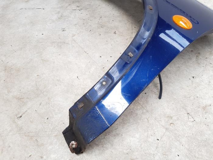Front wing, left from a Opel Corsa B (73/78/79)  1999