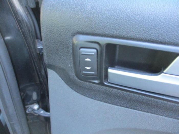 Interruptor de ventanilla eléctrica de un Ford Focus 2 Wagon 1.8 TDCi 16V 2007