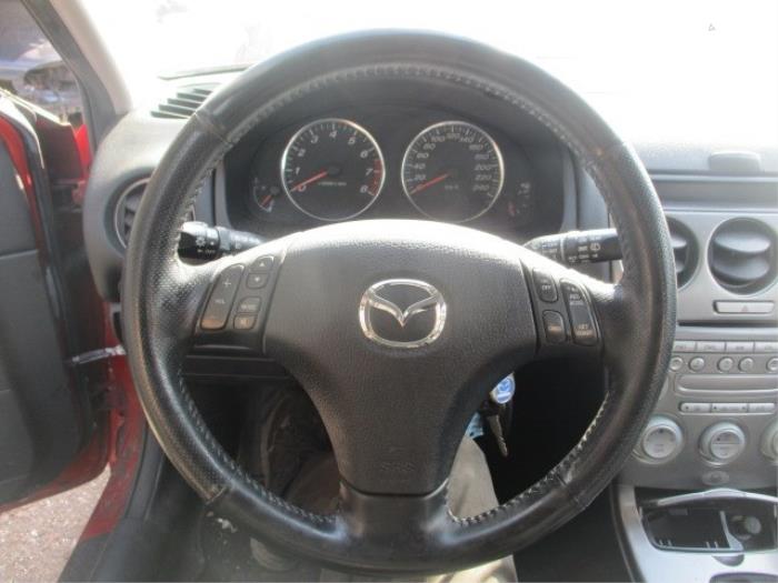 Steering wheel mounted radio control from a Mazda 6 Sportbreak (GY19/89) 2.0i 16V 2005