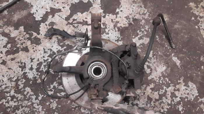 Front brake calliper, left from a Renault Kangoo Be Bop (KW) 1.5 dCi 90 FAP 2012