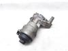 Oil filter housing from a Opel Astra H (L48) 1.9 CDTi 100 2006