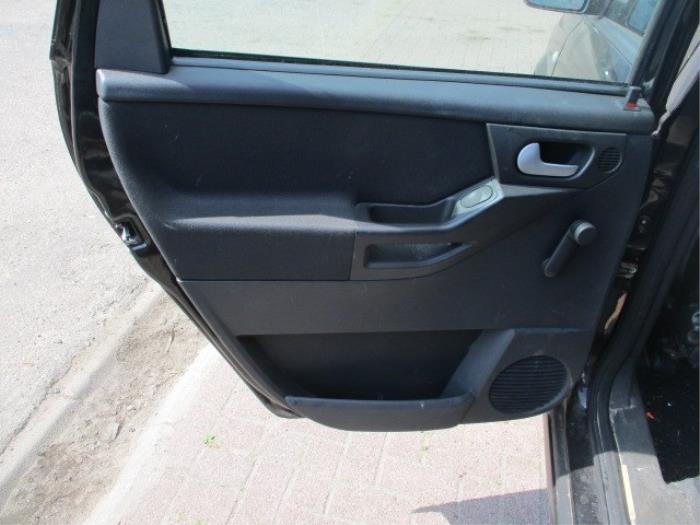 Rear door trim 4-door, left from a Opel Meriva 1.7 DTI 16V 2004