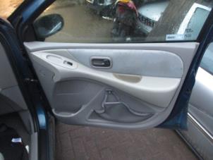 Używane Tapicerka drzwi prawych przednich wersja 4-drzwiowa Nissan Almera Tino (V10M) 1.8 16V Cena € 40,00 Procedura marży oferowane przez Boekholt autodemontage B.V