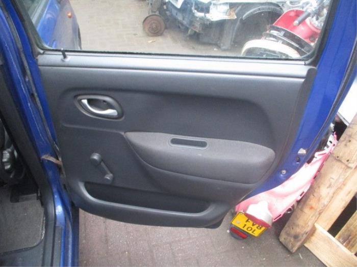 Rear door trim 4-door, right from a Opel Agila (A) 1.2 16V 2004