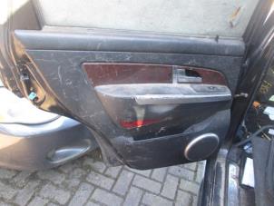 Used Rear door trim 4-door, left Ssang Yong Rexton 2.7 Xdi RX/RJ 270 16V Price on request offered by Boekholt autodemontage B.V