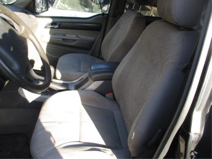 Seat, left from a SsangYong Musso 2.9TD 2004