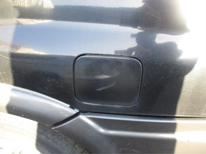 Tank cap cover from a SsangYong Musso 2.9TD 2004