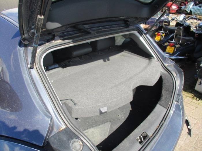 Parcel shelf from a Opel Astra H GTC (L08) 1.8 16V 2009