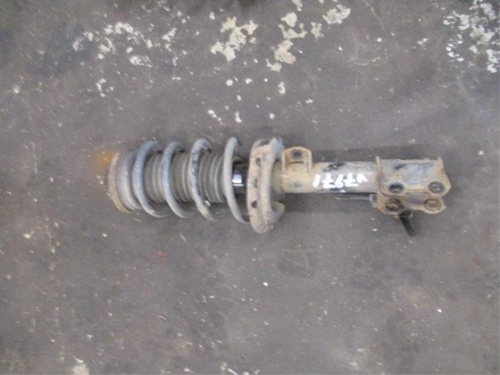 Front shock absorber rod, left from a Opel Astra H GTC (L08) 1.8 16V 2009