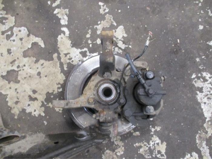 Front wheel hub from a Opel Astra H GTC (L08) 1.8 16V 2009