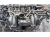 Intake manifold from a Volkswagen Polo III (6N2) 1.4 2000