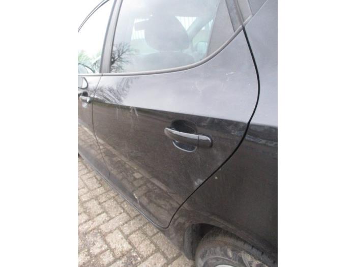 Rear door handle 4-door, left from a Seat Ibiza IV (6J5) 1.2 TDI Ecomotive 2011