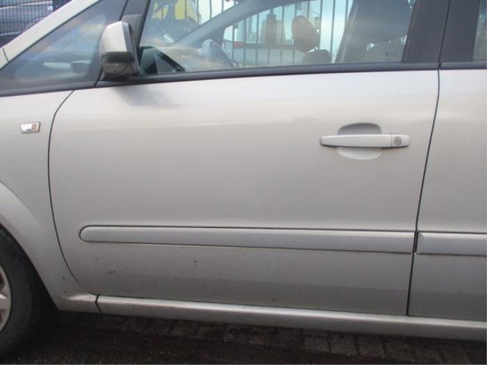 Poignée portière 4portes avant gauche d'un Opel Zafira (M75) 1.6 16V 2007